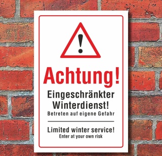Schild "Eingeschränkter Winterdienst, deutsch & englisch"