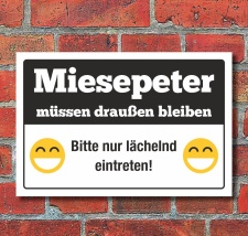 Schild Miesepeter draußen bleiben Lächeln...
